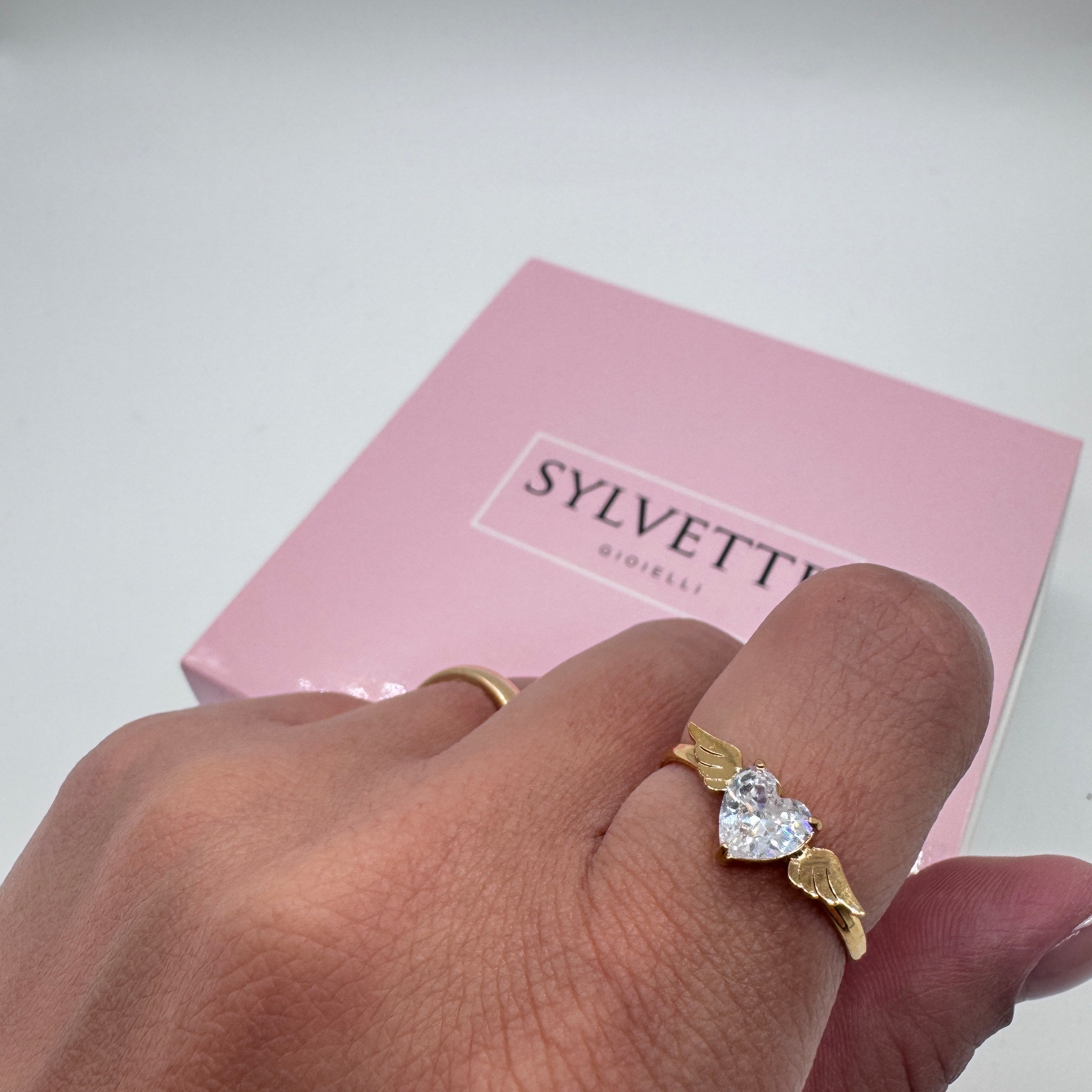 Anello cuore alato